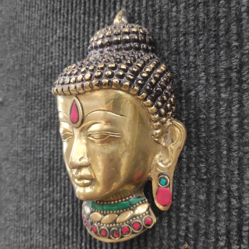 Brass Buddha face