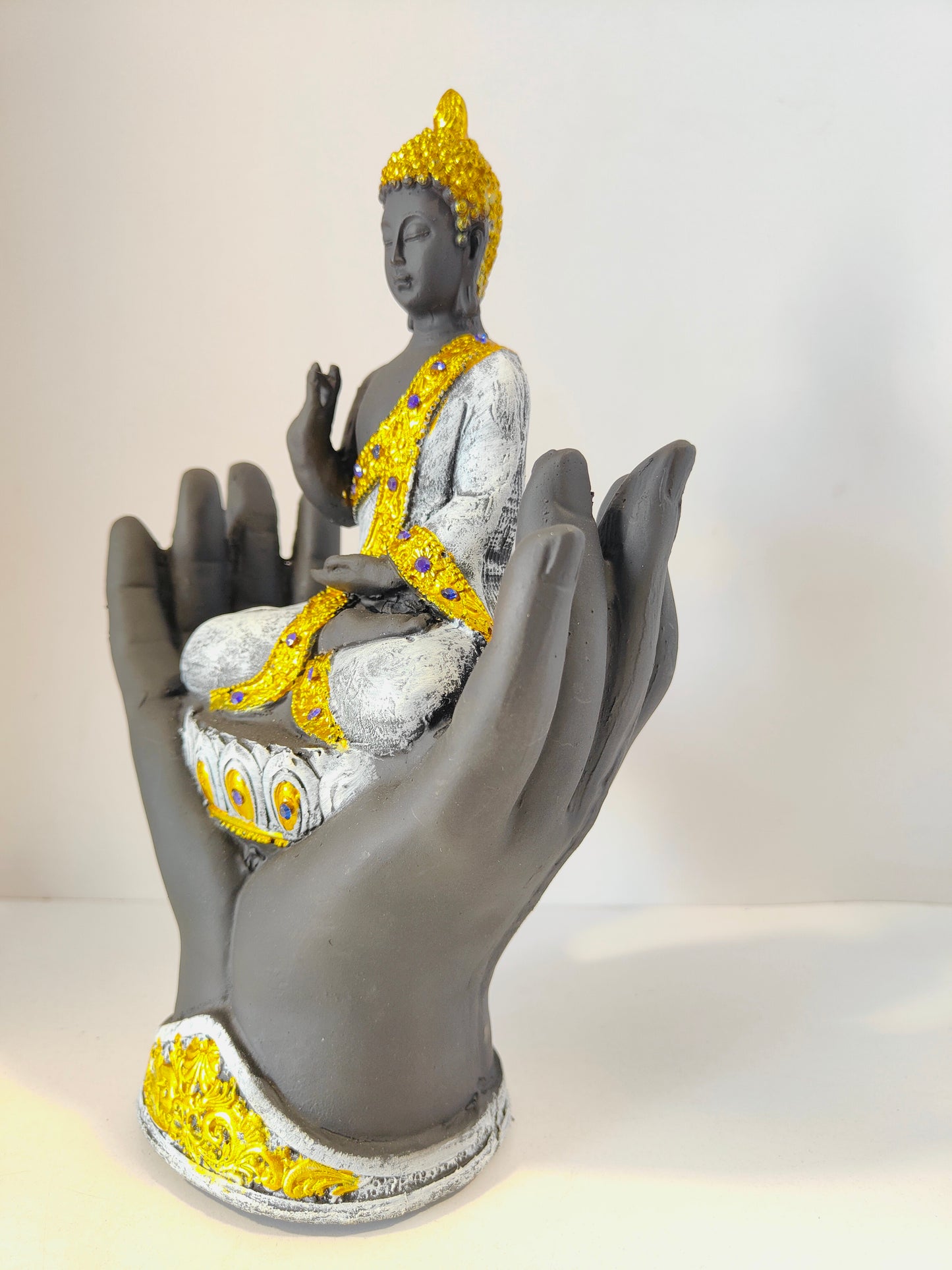 Meditating Lord Buddha Sitting on Hands