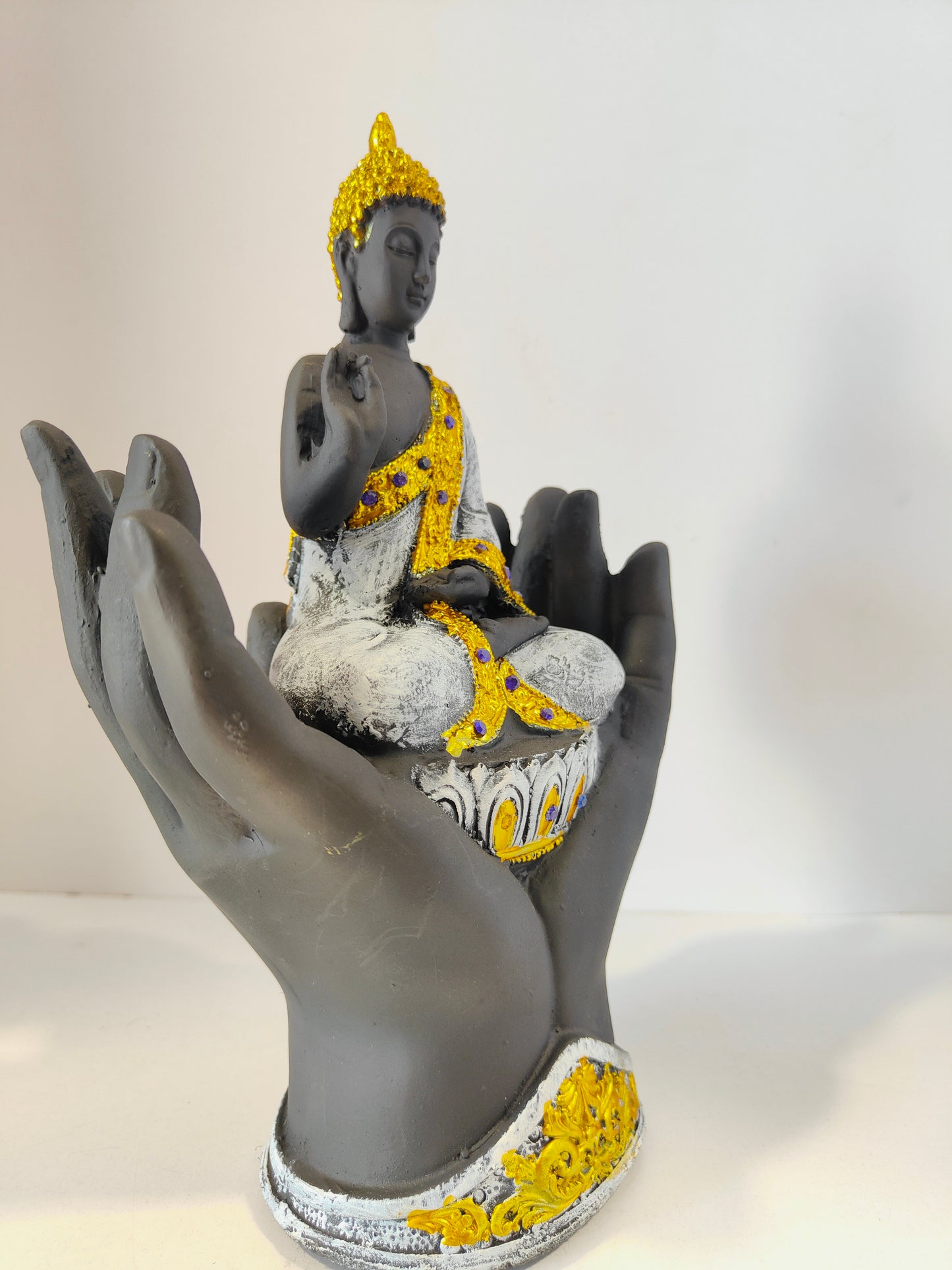 Meditating Lord Buddha Sitting on Hands