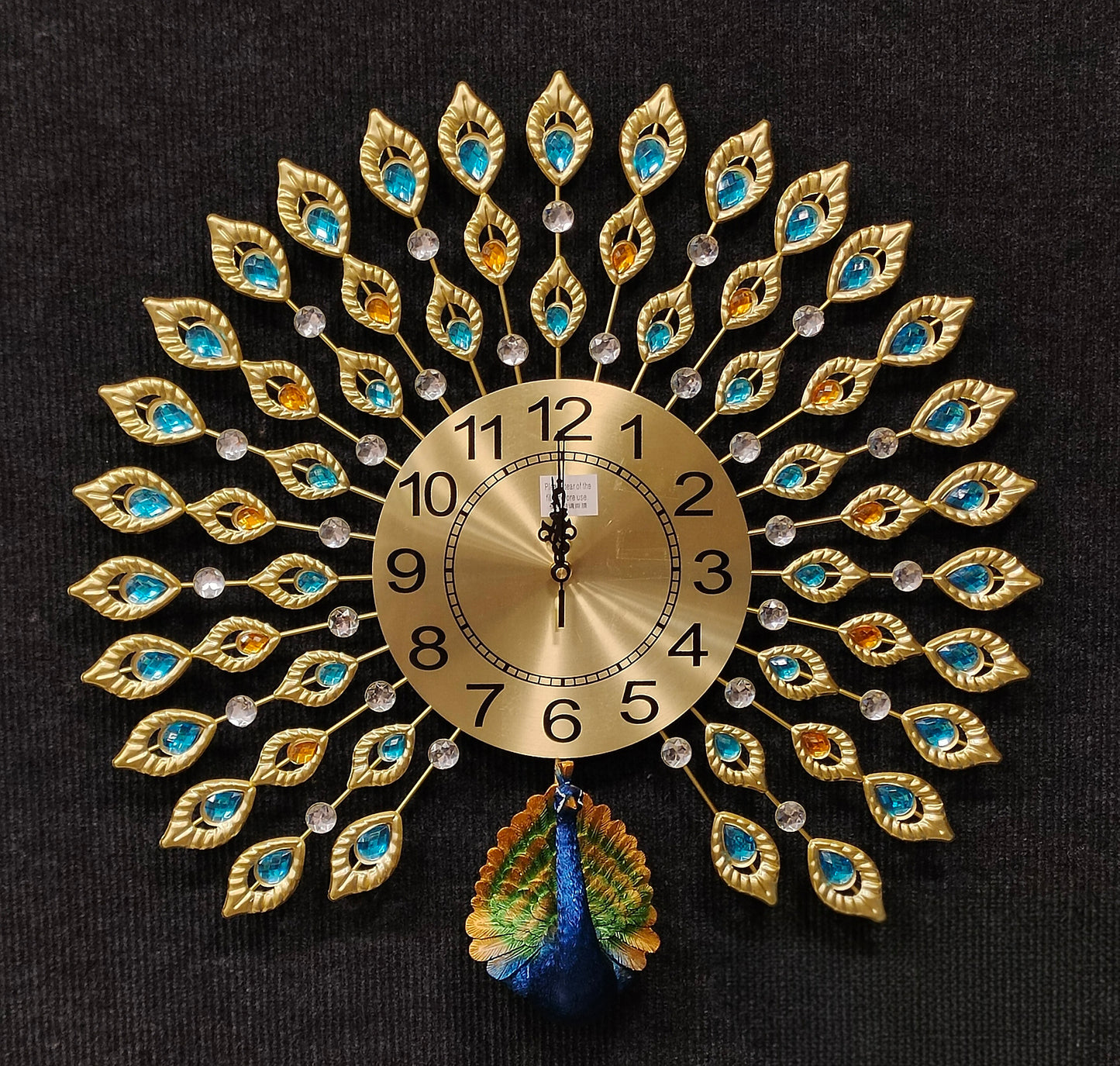 Decorative wall clock with peacock feather design