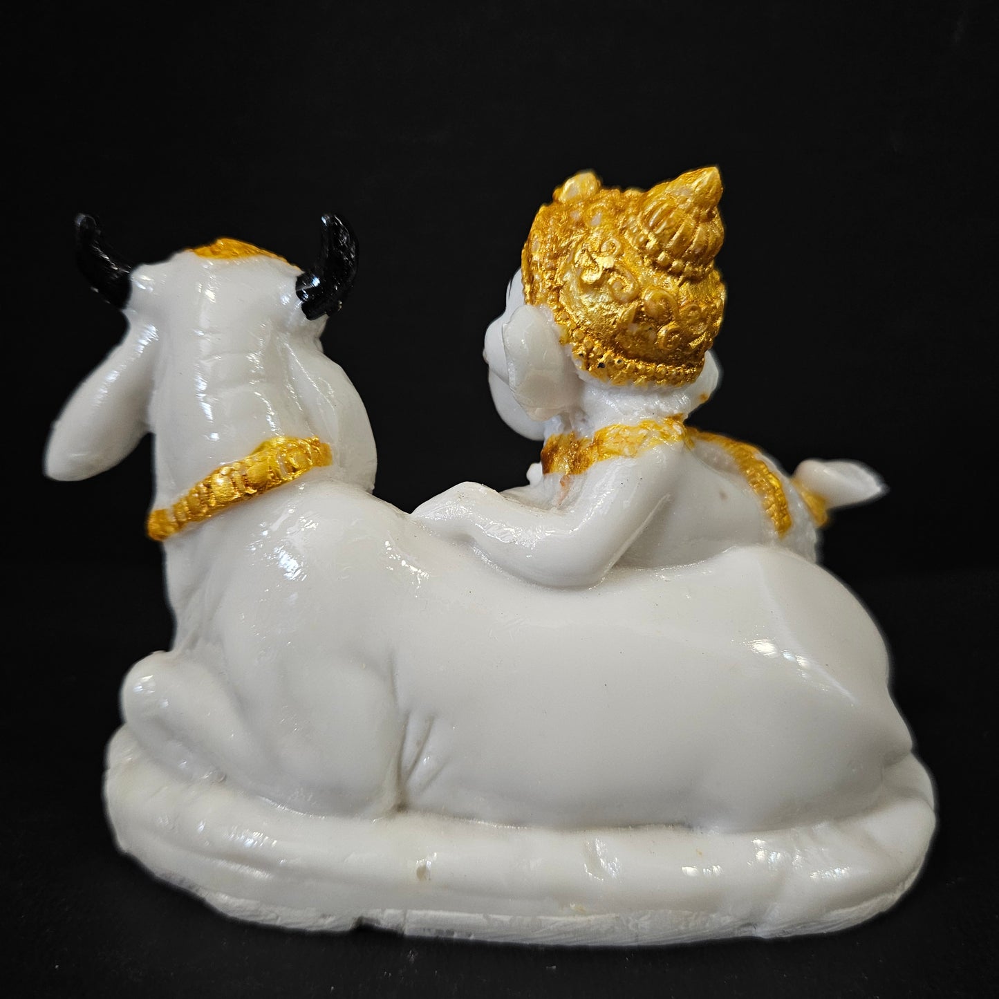 Handcrafted Polyresine Lord Ganesha on Cow Decorative Showpiece, Best for Home Decor