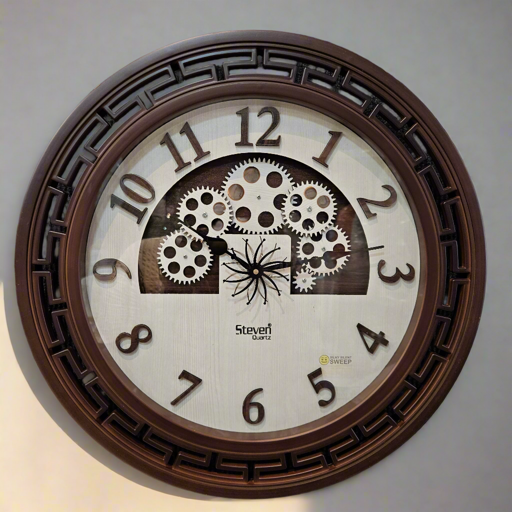 Wall clock with gear design and brand logo on a dark background