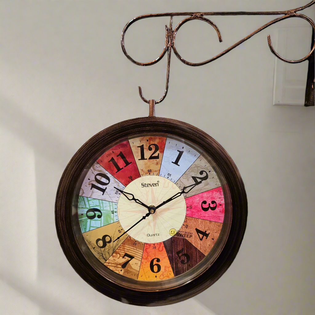 Decorative clock with colorful face on a textured dark surface