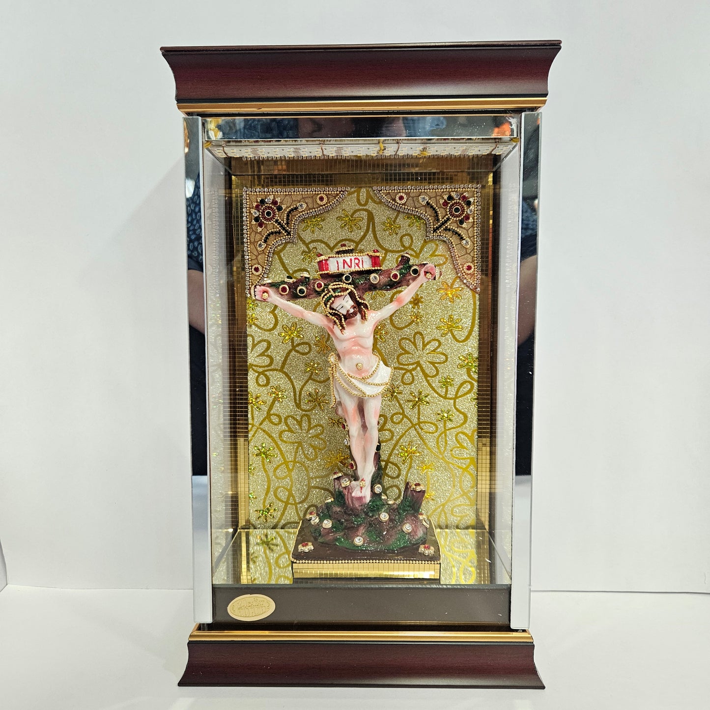 24 carat gold Plated Jesus on cross Statue Decorated with stones in a transparent protective cabin