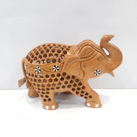 Wooden elephant trunk up with inside ele