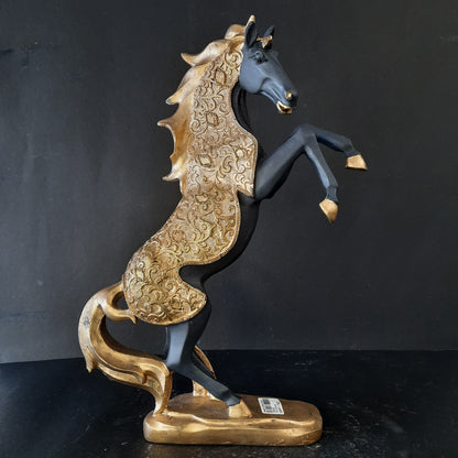 Gold dressed horse standing on two showpiece