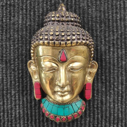 Brass Buddha face