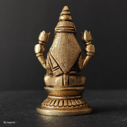 Laxmi Ji Sitting on Round Shape Base Idol