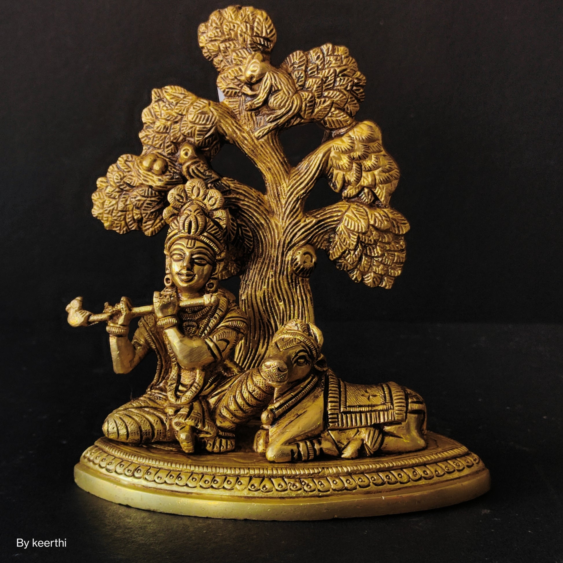 Metal Krishna with Cow Sitting Showpiece Under Tree Plying Flute Decorative Showpiece for for Office,Temple Diwali Janmashtami Puja and Home Kamdhenu Idol