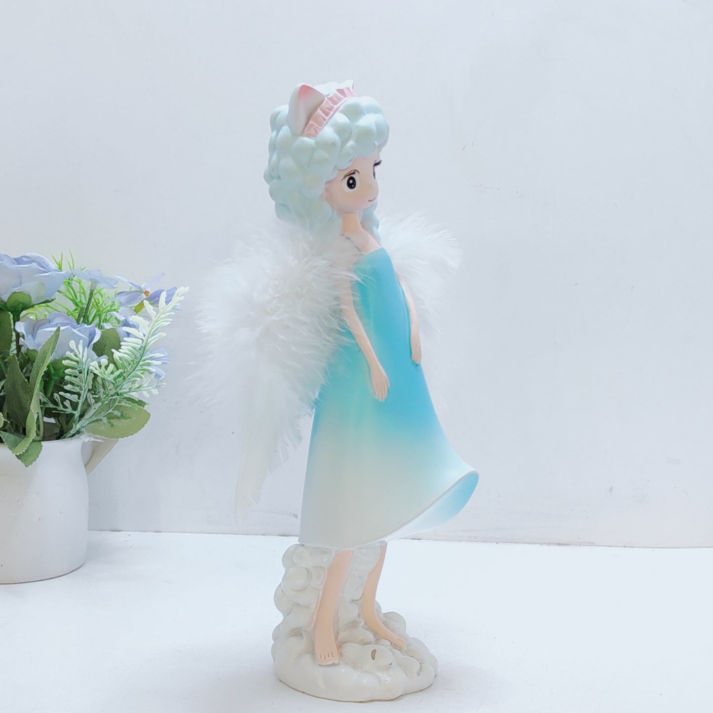 Angel girl with ears or horns on a cloud wings feather