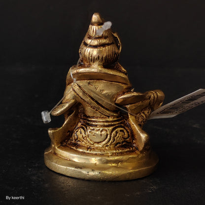 Brass Kuber Statue