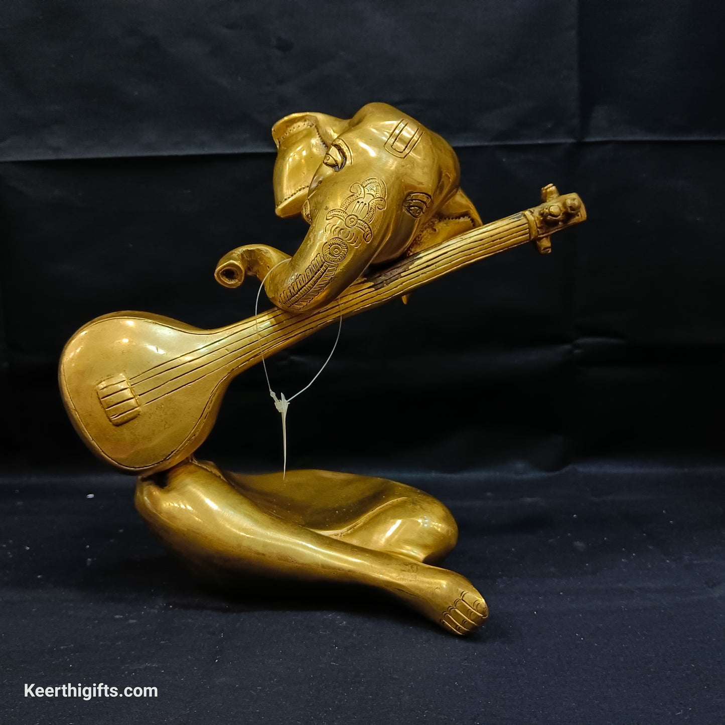 Modern Ganesh playing sitar brass antique idol