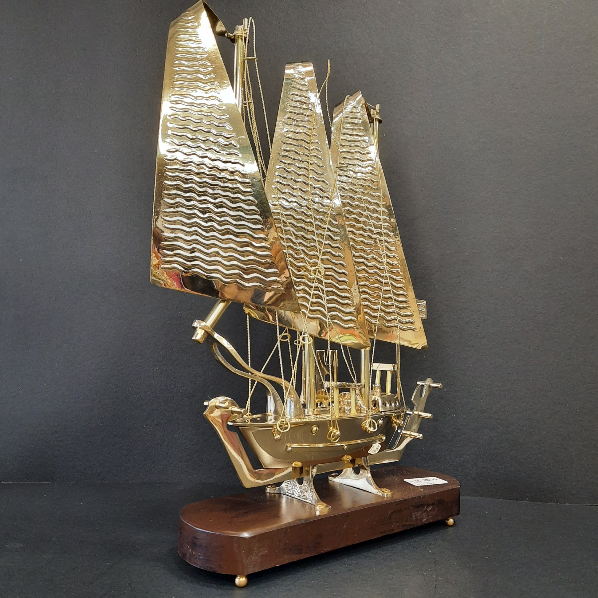 Golden metal ship showpiece