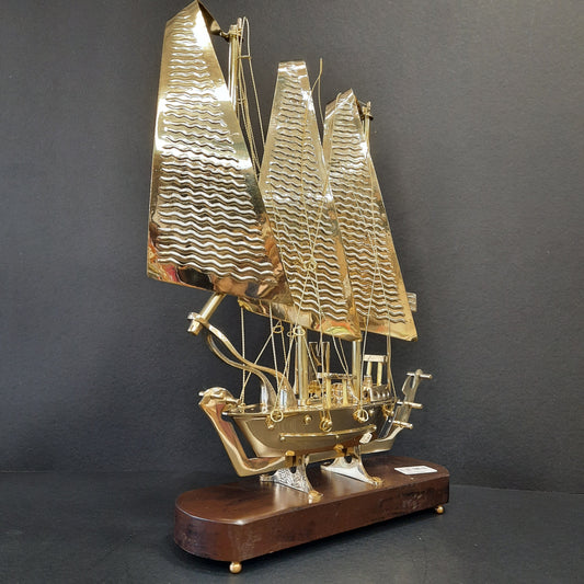 Golden metal ship showpiece