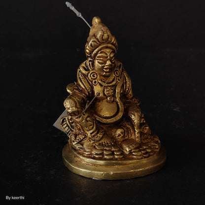 Brass Kuber Statue