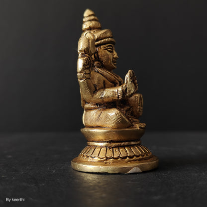 Laxmi Ji Sitting on Round Shape Base Idol