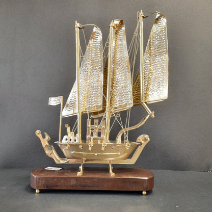 Golden metal ship showpiece