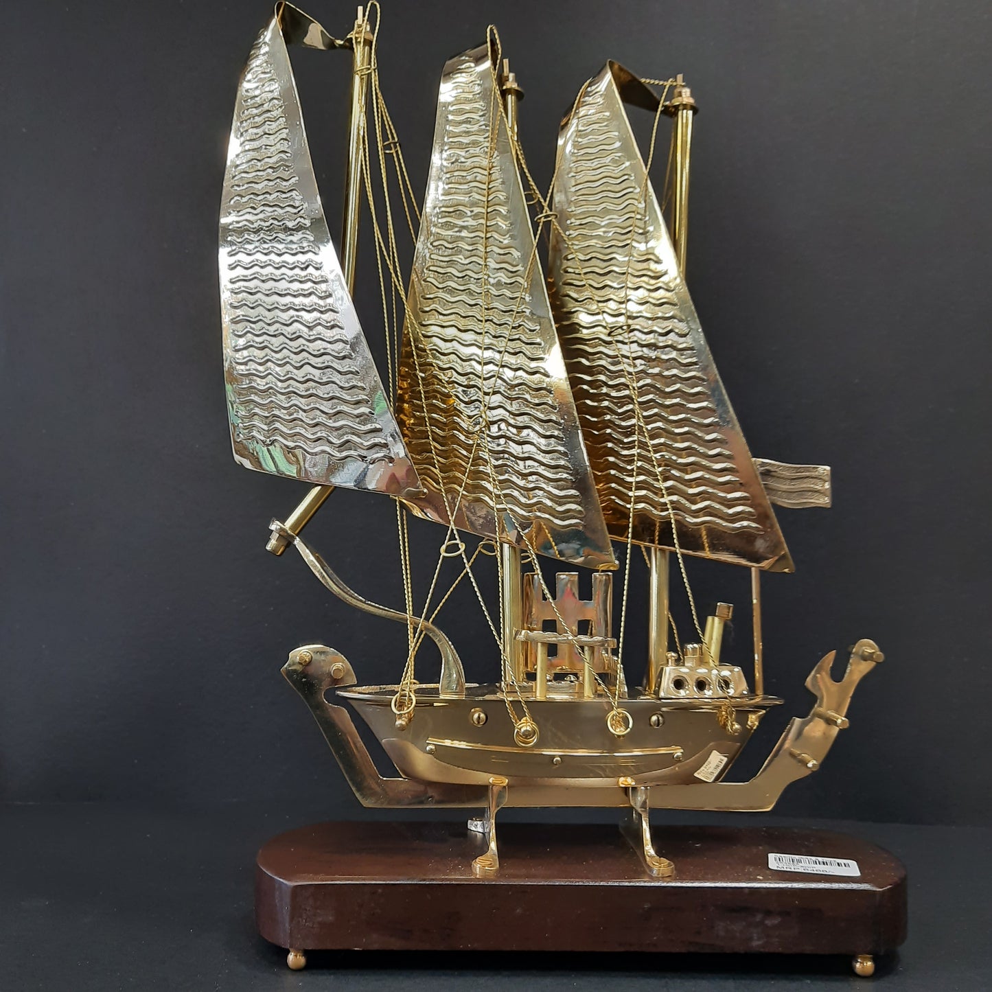Golden metal ship showpiece