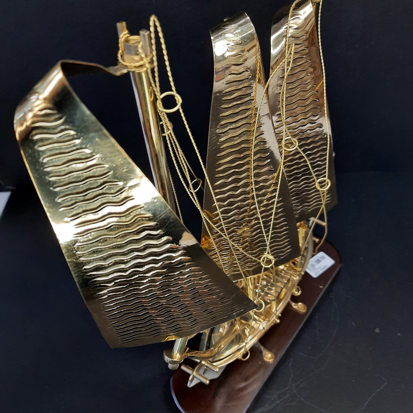 Golden metal ship showpiece