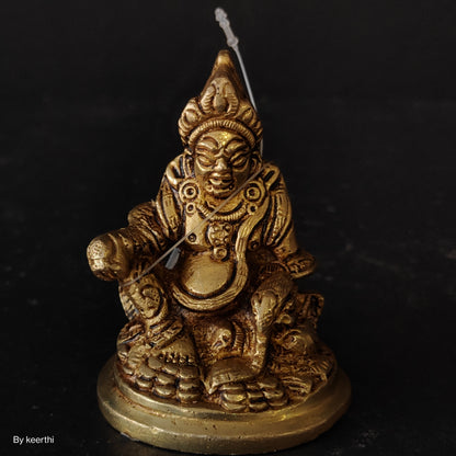 Brass Kuber Statue