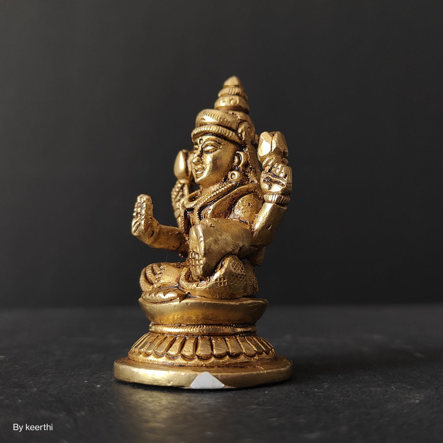 Laxmi Ji Sitting on Round Shape Base Idol