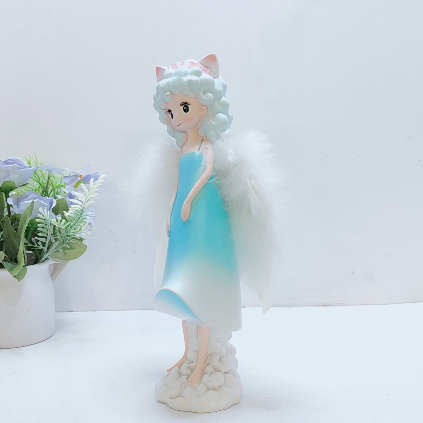 Angel girl with ears or horns on a cloud wings feather