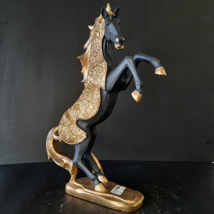 Gold dressed horse standing on two showpiece