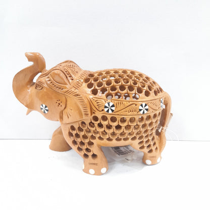Wooden elephant trunk up with inside ele