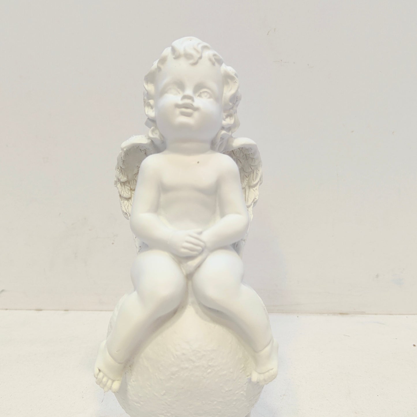 Resin decoration representing an angel