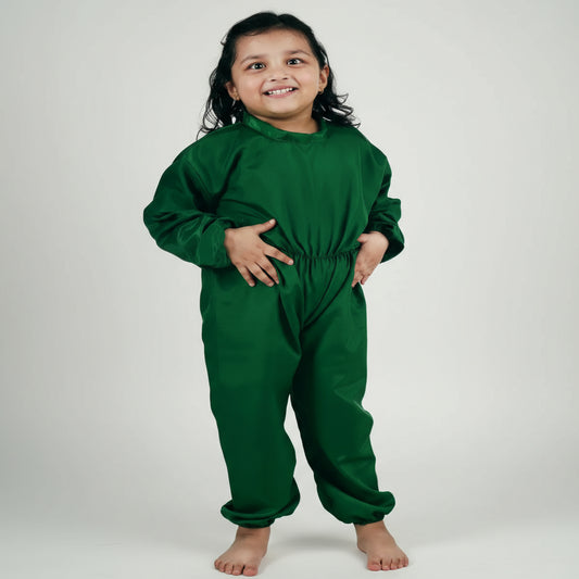 Child wearing a green onesie Fancy Dress Rajahmunry