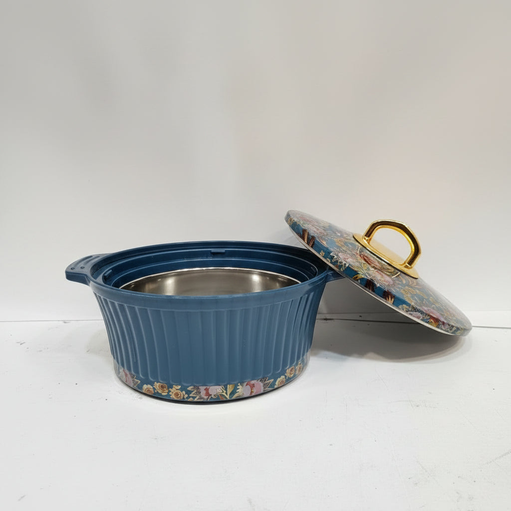 Blue ceramic pot with floral design and matching lid on a white background