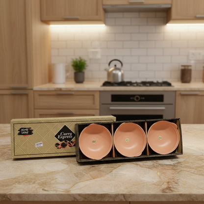 Set of three ceramic bowls in a decorative box with 'Curry Express' branding on a light gray background.