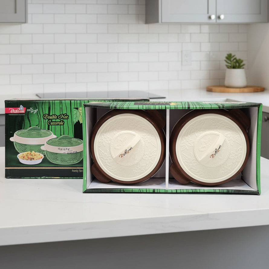 Two ceramic bowls in a box with a green and white label on a gray background