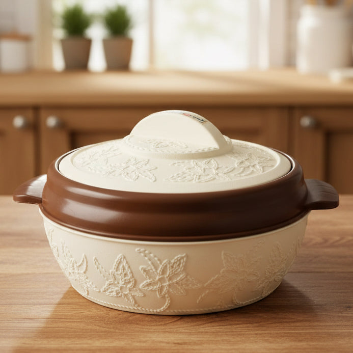 Ceramic cooking pot with brown lid on a white background