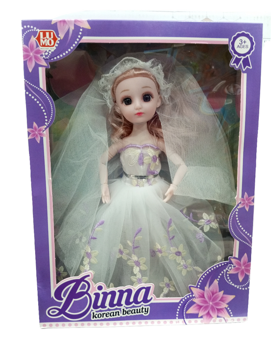 Binna korean beauty The doll is dressed in a white wedding gown with floral embroidery and has a veil.