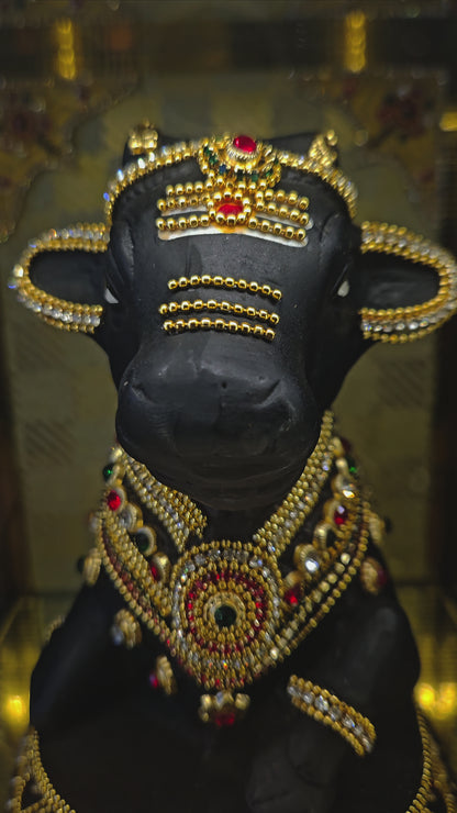 24 carats gold Plated Nandi Statue idol Decorated with attractive stones in transparent protective cabin