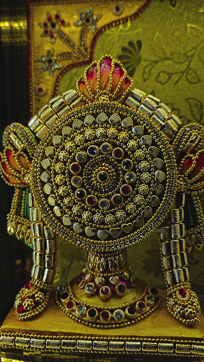 24 carats gold Plated Shank Chakra Tilakh idol Statue showpiece Figurine in a transparent protective cabin