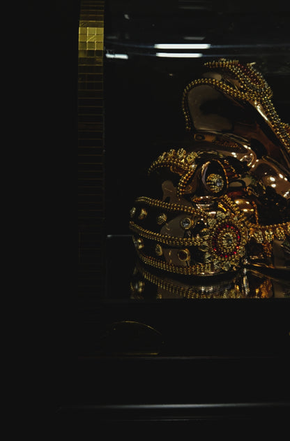 24 carat gold Plated resting position vinayaka idol with stone designer,transparent protective cabin