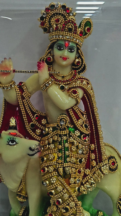 24 carats gold Plated stones designer Krishna Idol Statue Showpiece in transparent protective cabin