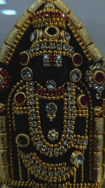 Lord Balaji 24carats gold Plated Balaji decorated with attractive stones in transparent protective cabin