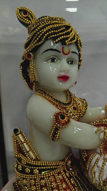 24carat gold Plated little Krishna idol Statue Showpiece in transparent protective cabin
