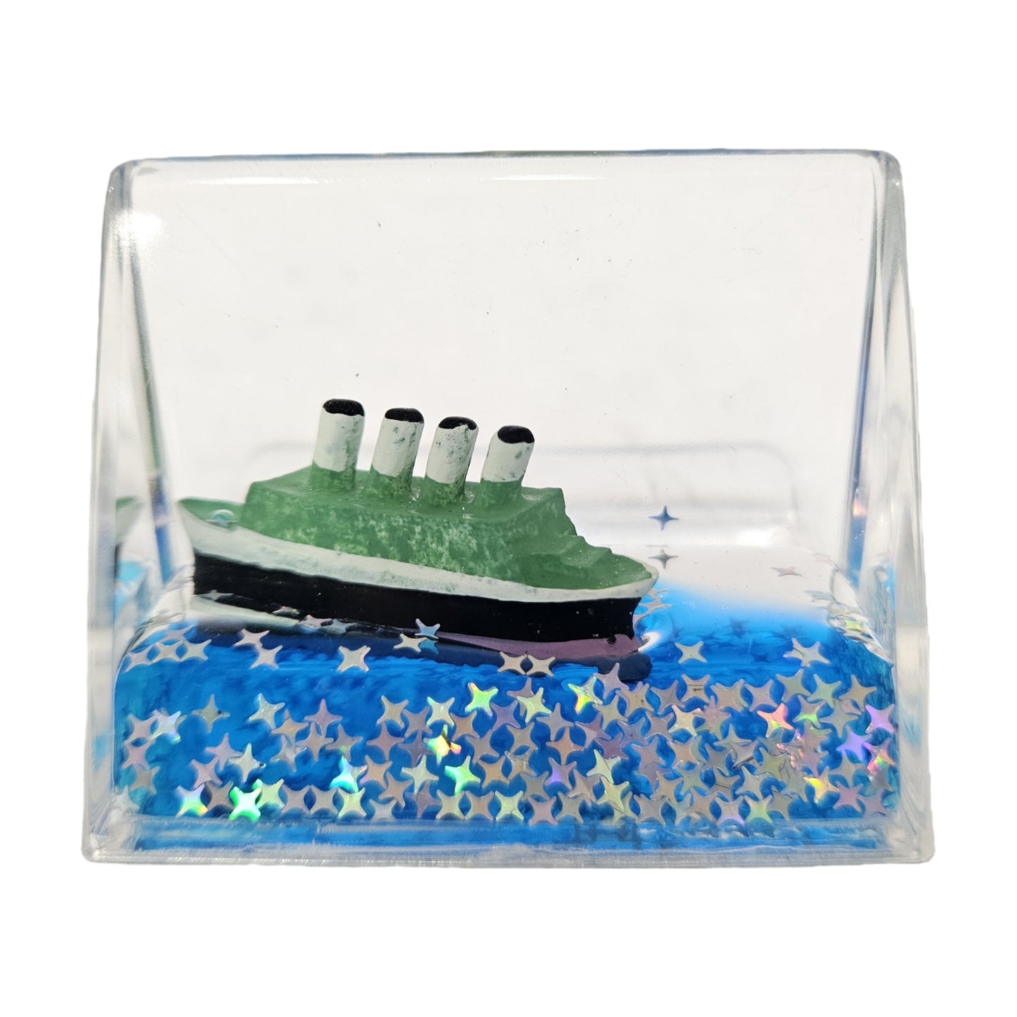 Green and black Titanic liquid motion showpiece is a decorative accent for tabletops or car dashboards, featuring a miniature ship that floats in blue liquid