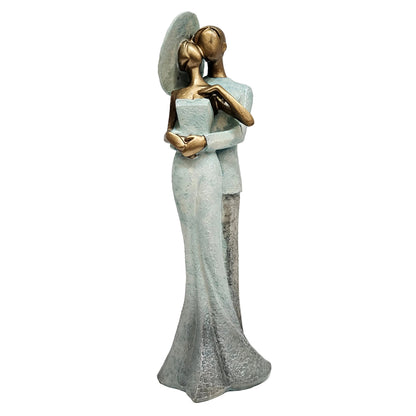 Romantic couple statue is styled with a blue and bronze color finish Showpiece Figurine