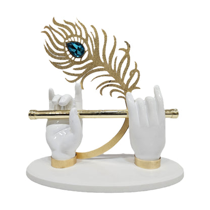Lord Krishna hand idol features white resin hands holding a flute and a prominent peacock feather Showpiece