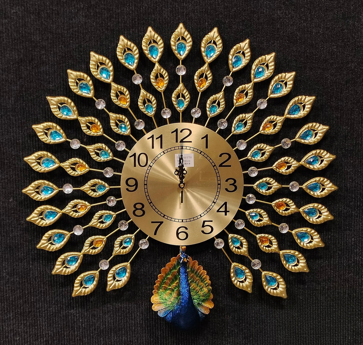 Decorative wall clock with peacock feather design