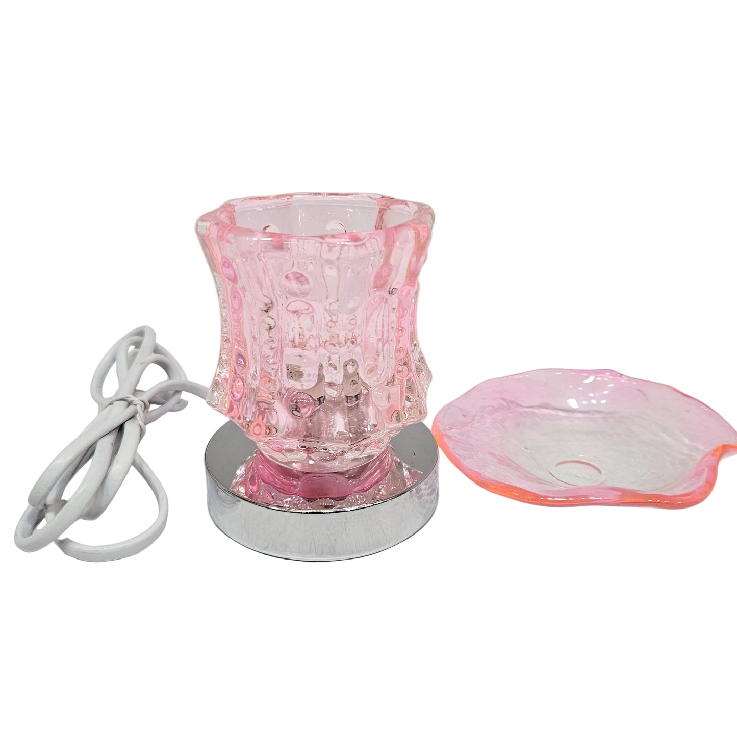 Electric fragrance oil lamp and wax melt warmer. It serves as both an aromatherapy diffuser and an accent nightlight