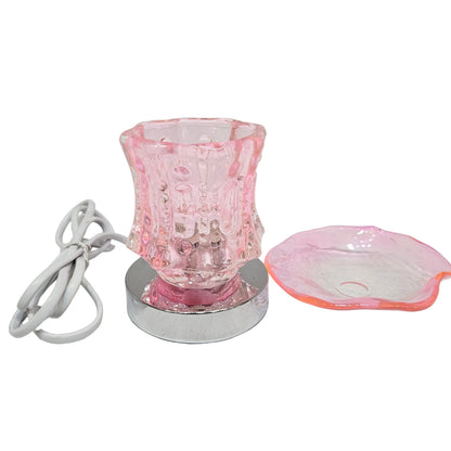 Electric fragrance oil lamp and wax melt warmer. It serves as both an aromatherapy diffuser and an accent nightlight