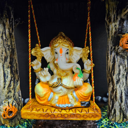Polyresin Lord Ganesha Idol Resting On A Swing statue Showpiece