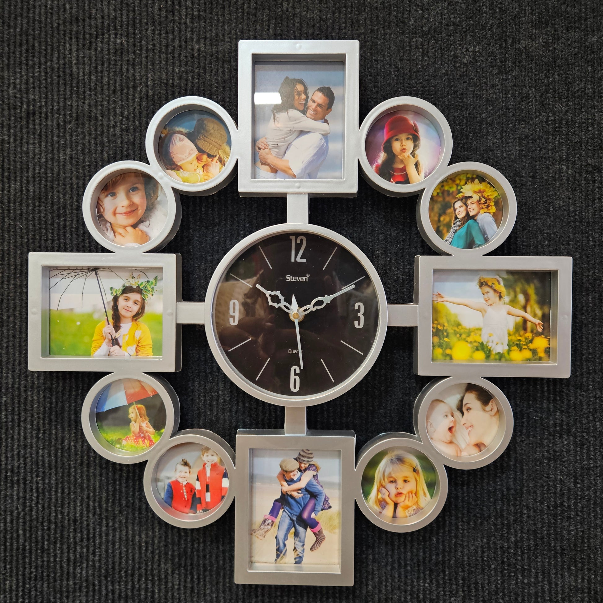 Wall clock with multiple photo frames on a dark textured background
