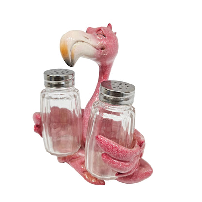 Flamingo set a resin holder holding two glass salt and pepper shakers